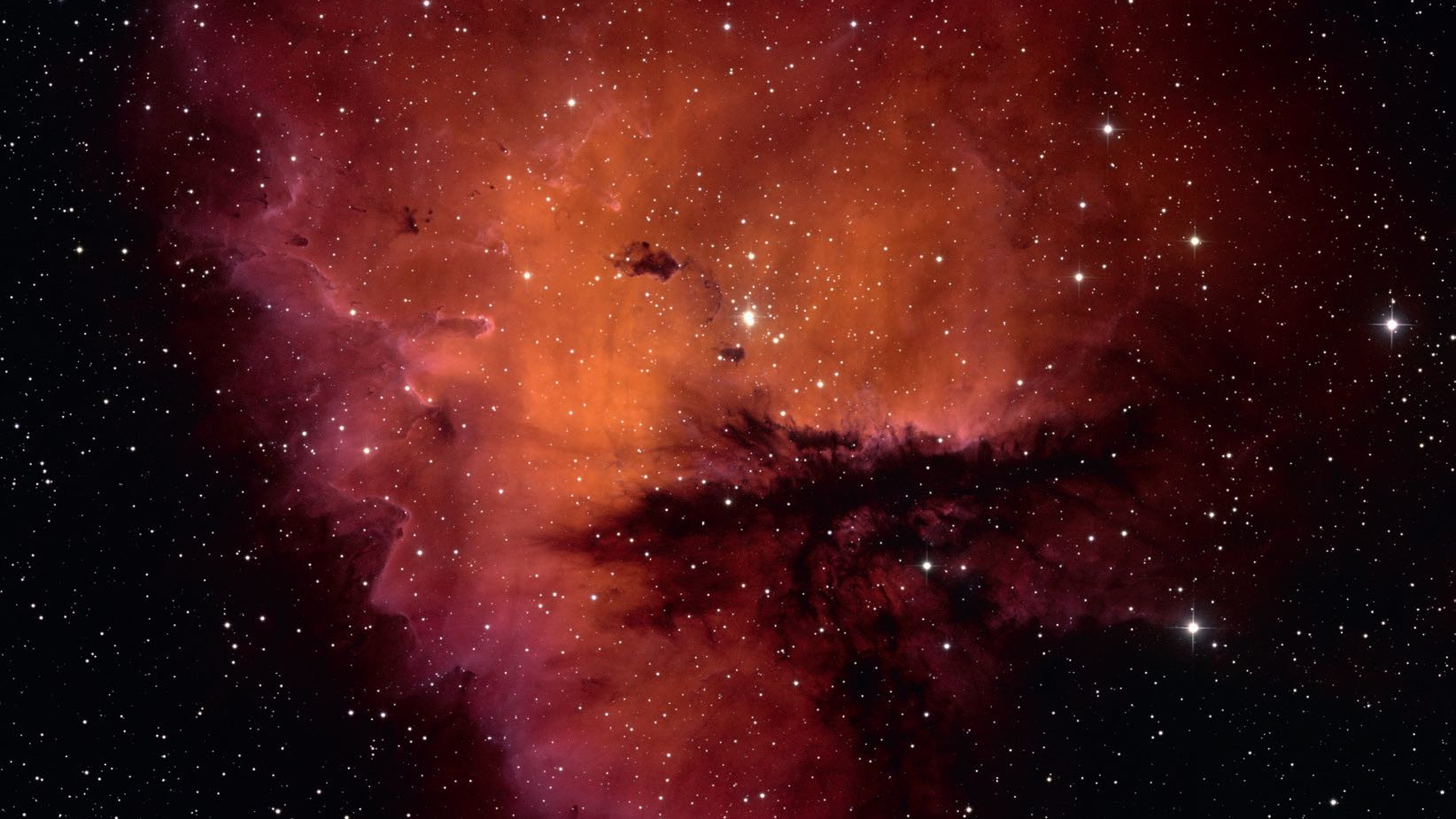 Tanto a simple vista como en las astrofotos, NGC 281 adopta la forma del Pacman. NSF/AURA/WIYN/T. Rector (Universidad de Alaska)